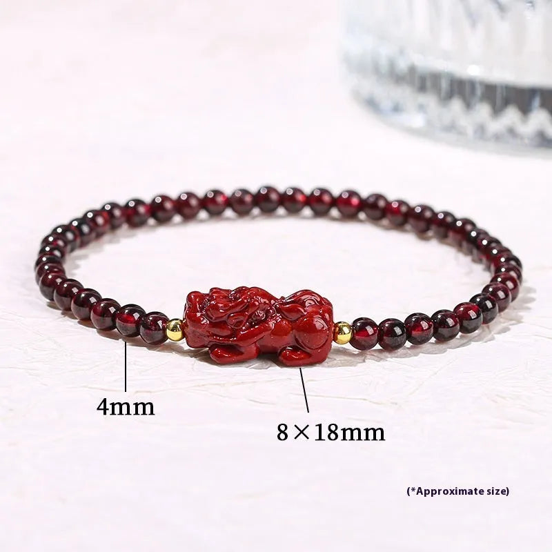 Women's garnet bracelet with purple sand pixiu carving and strawberry quartz square beads