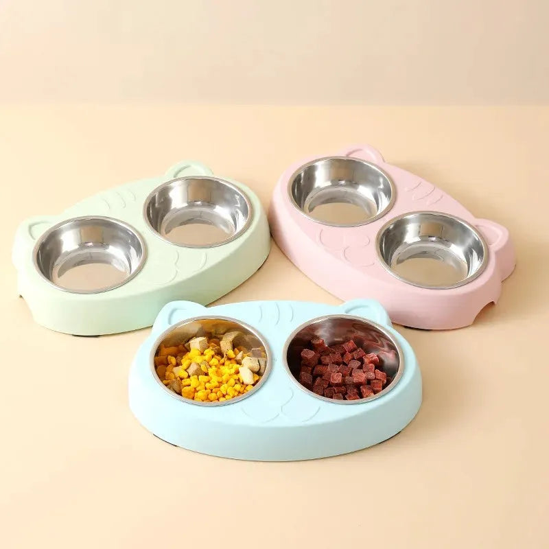 Blue double compartment plastic pet feeder tray for cat or dog food and water.