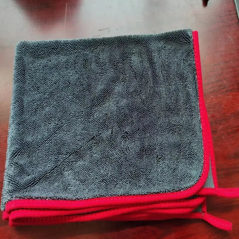 Grey twisted braid microfiber car cleaning towel with a red edge, shown in various sizes for automotive detailing.