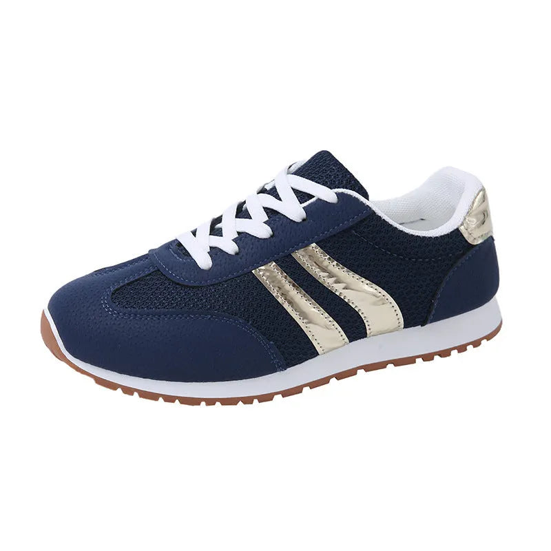 Blue women's casual sports shoes with cross shoulder straps and a white rubber sole.