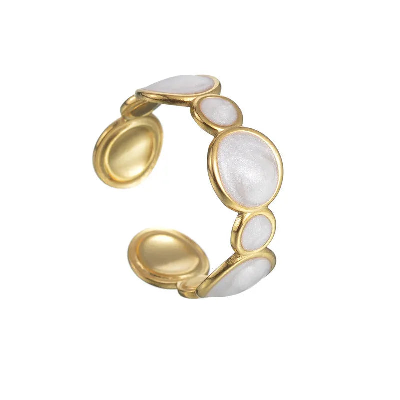 Stainless steel geometric ring with an adjustable opening band for women.