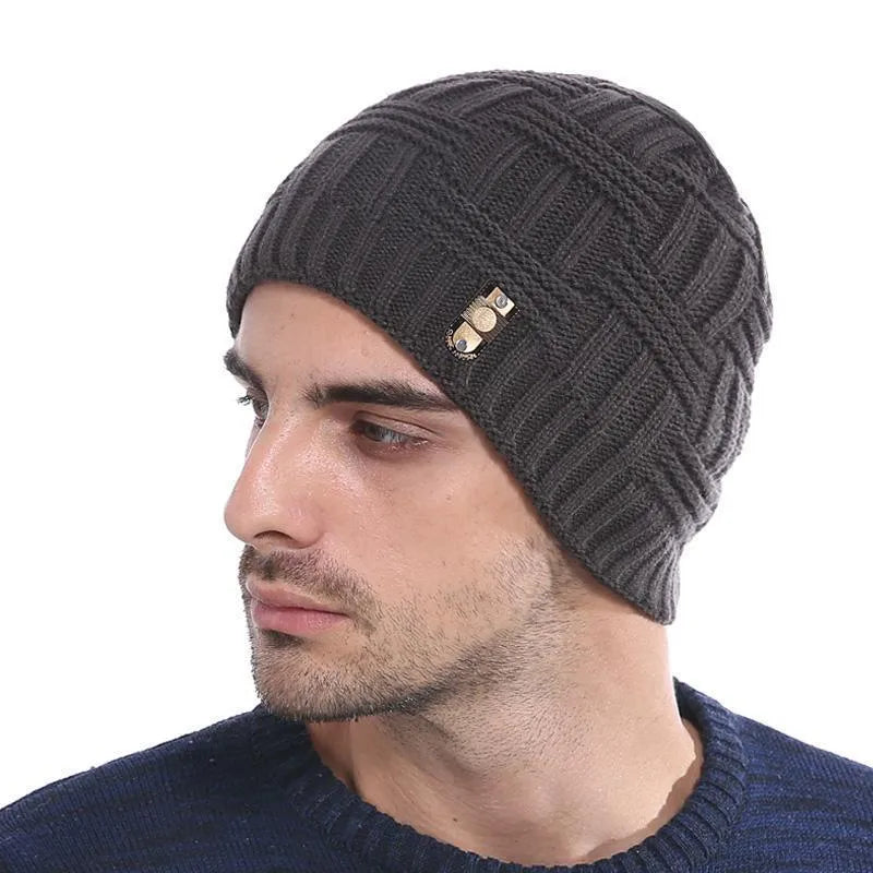 Winter bonnet knit hat in thick cable knit, turned-up hem, solid colour, fits most adults