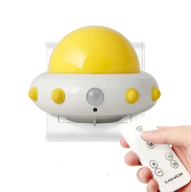 Remote control UFO bedside night light in blue, pink, or white with colourful LED lighting