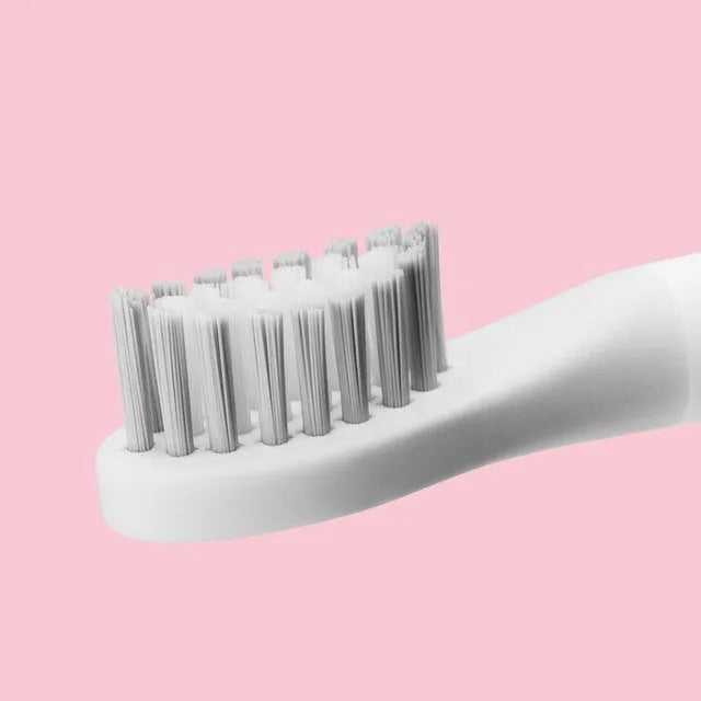 SOOCAS sonic electric toothbrush in blue or pink with round brush head