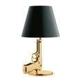 Creative resin desk lamp with plated gold pistol shape on a desk, 235x425mm, Nordic style