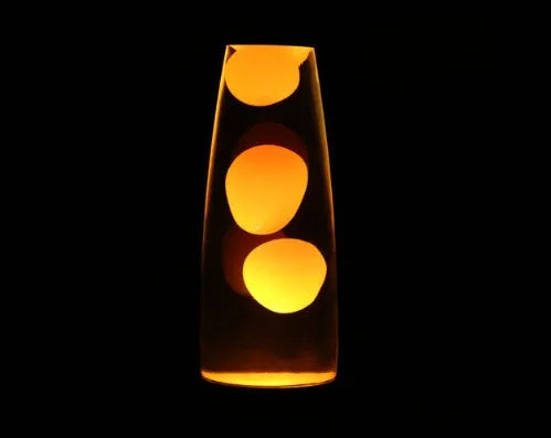 Blue lava lamp with metal base and glass bottle showing wax rising in heated liquid
