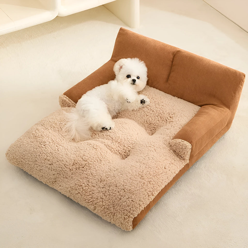 Grey pet nest cushion mat for small dog, shown in medium size with dimensions 58cm long by 43cm wide.