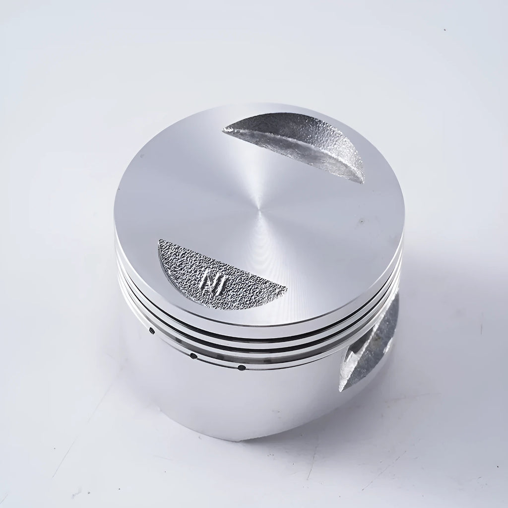 Motorcycle engine piston kit showing aluminium alloy construction with 57.4mm diameter measurement