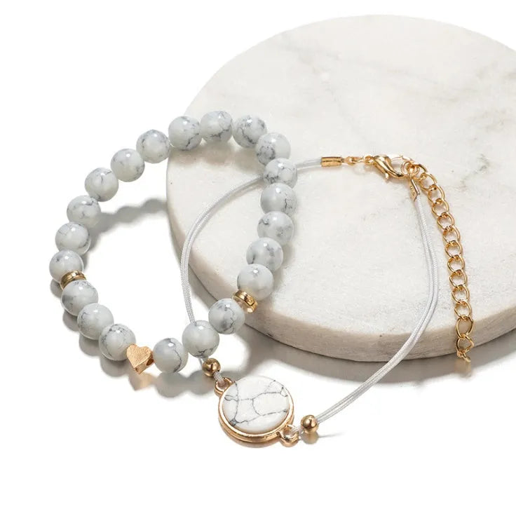 Geometric creative hollow fringed pine stone bracelet four-piece set in white alloy with electroplated finish