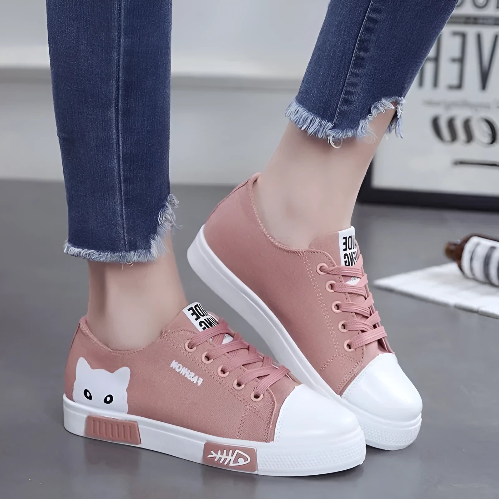 Cat fish canvas shoes with breathable canvas upper and lace-up closure, available in pink, black, and white