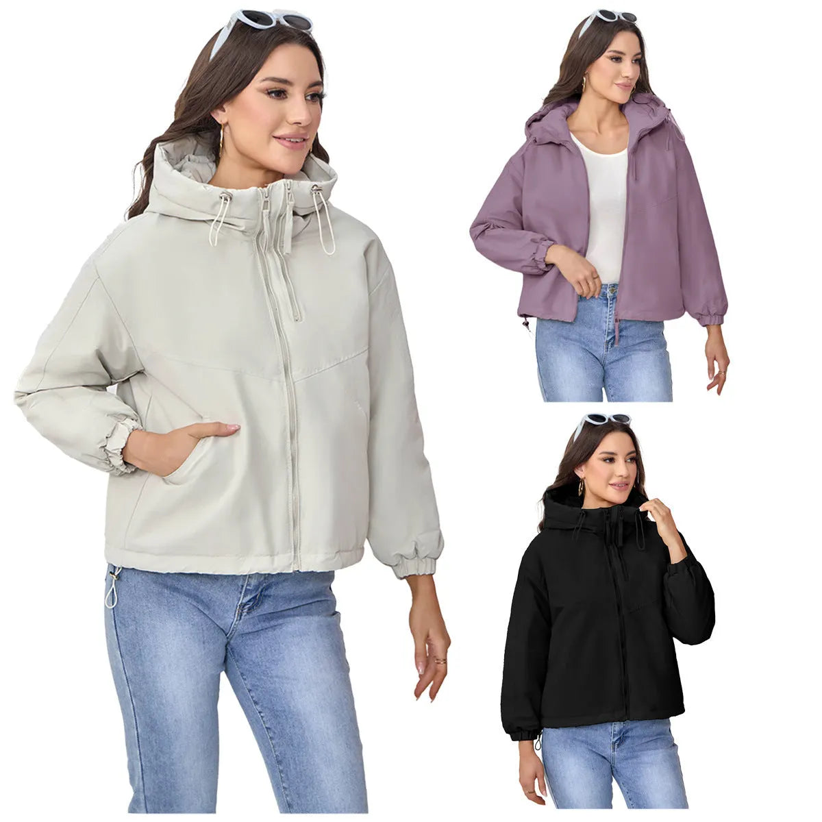 Women's loose fit hooded shell jacket in polyester, shown in grey, black, or purple.