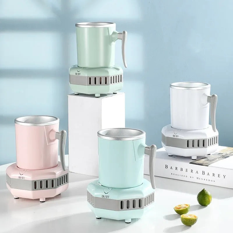 White quick-cooling aluminium cup on its electronic base station with power adapter