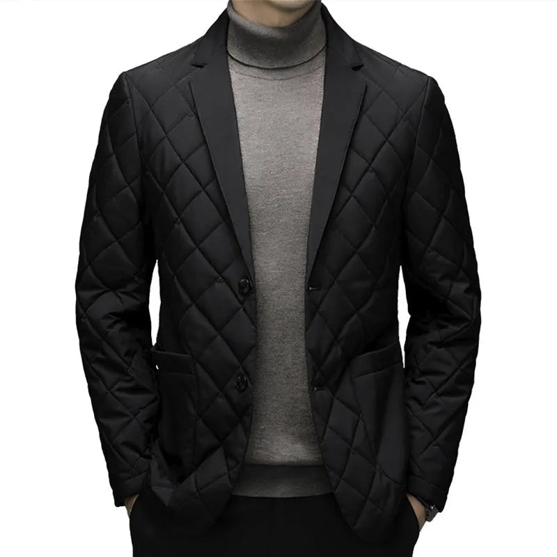 Man wearing a solid colour thick lapel down jacket with side seam pockets.