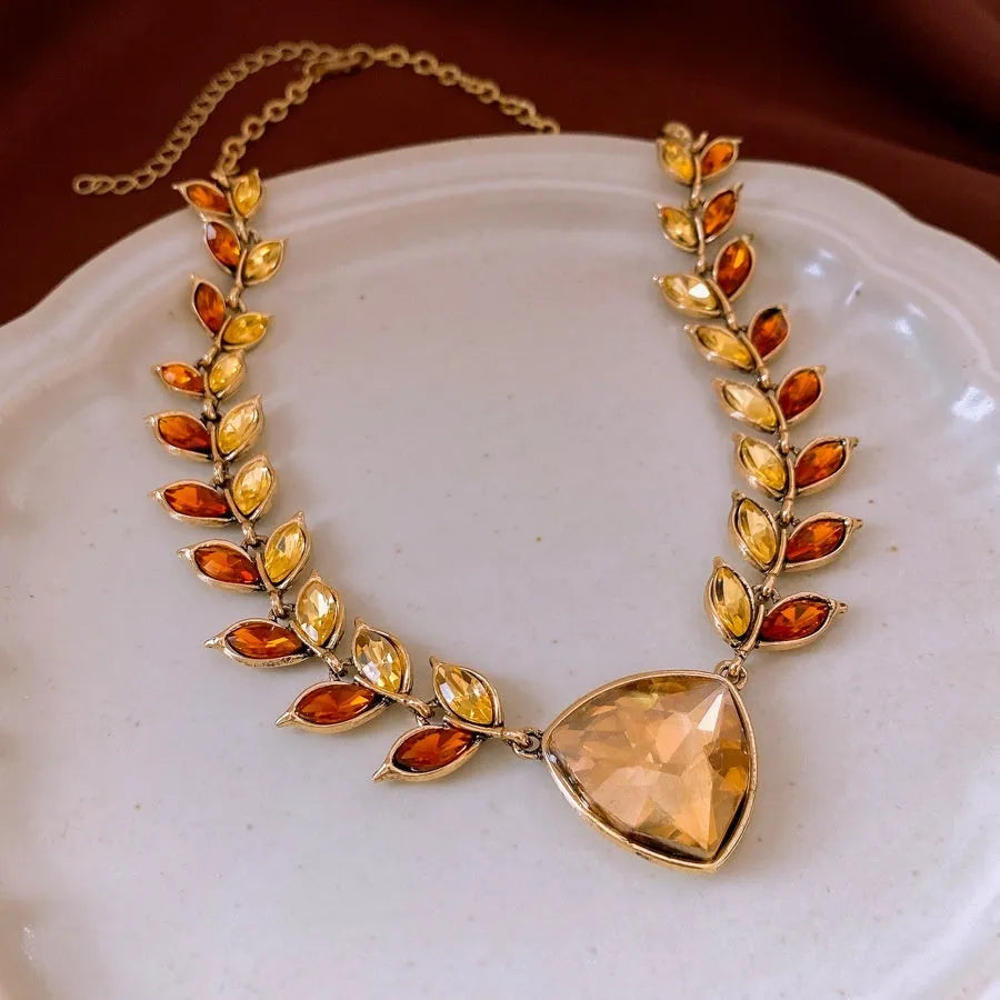 Retro flower pendant necklace in golden brown alloy with wheat detailing, 51-60cm clavicle chain