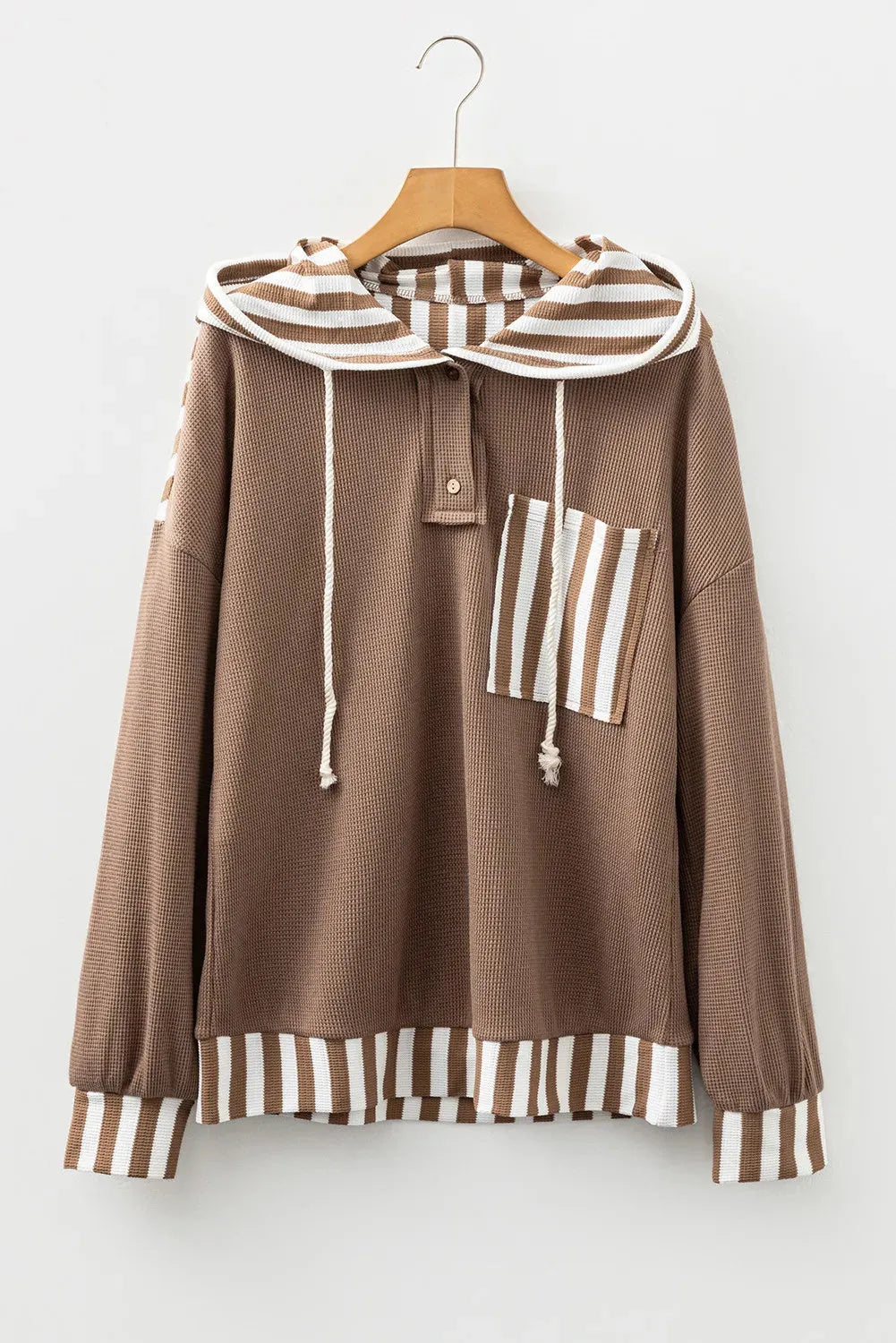 Straw yellow striped patchwork hoodie with waffle texture fabric and a drawstring hood.