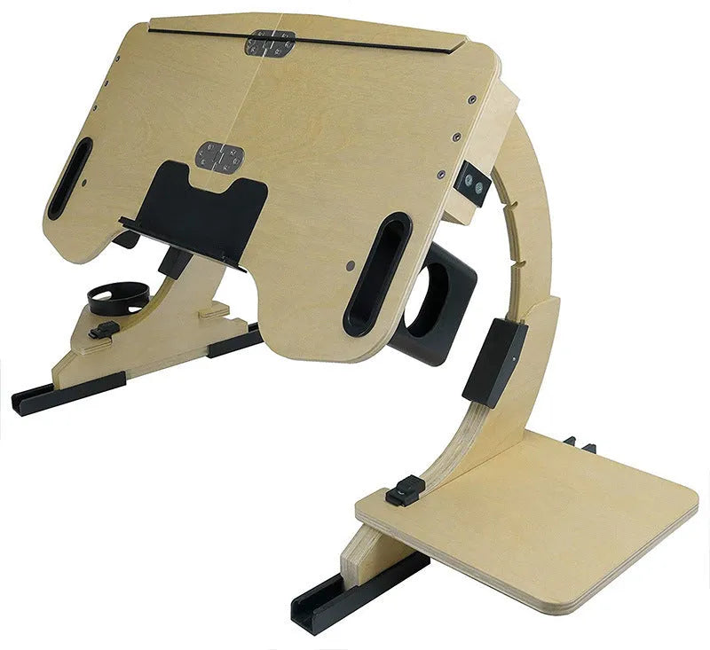 White maple wooden bed table holding a laptop at an angle, folded legs visible on a duvet.