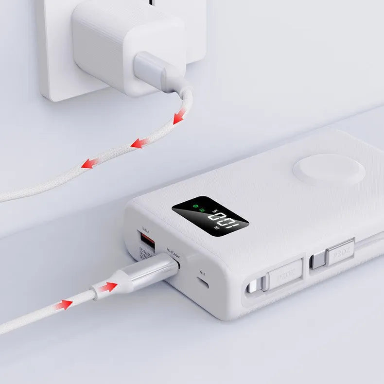 Black and white wireless power bank showing display screen and attached charging cable