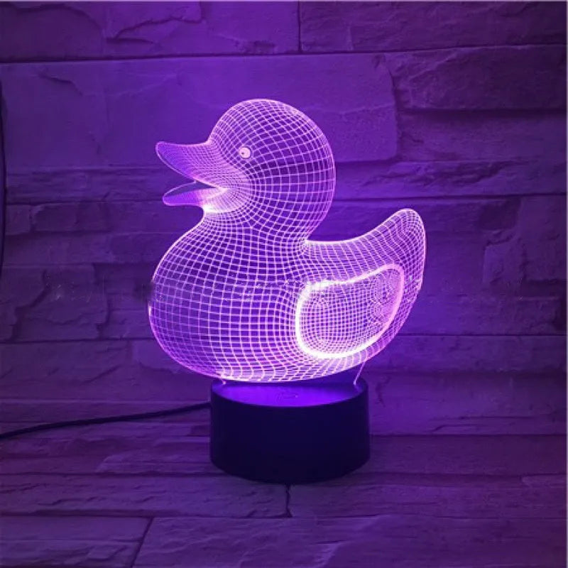 3D yellow duck shaped LED night light with remote control on a table