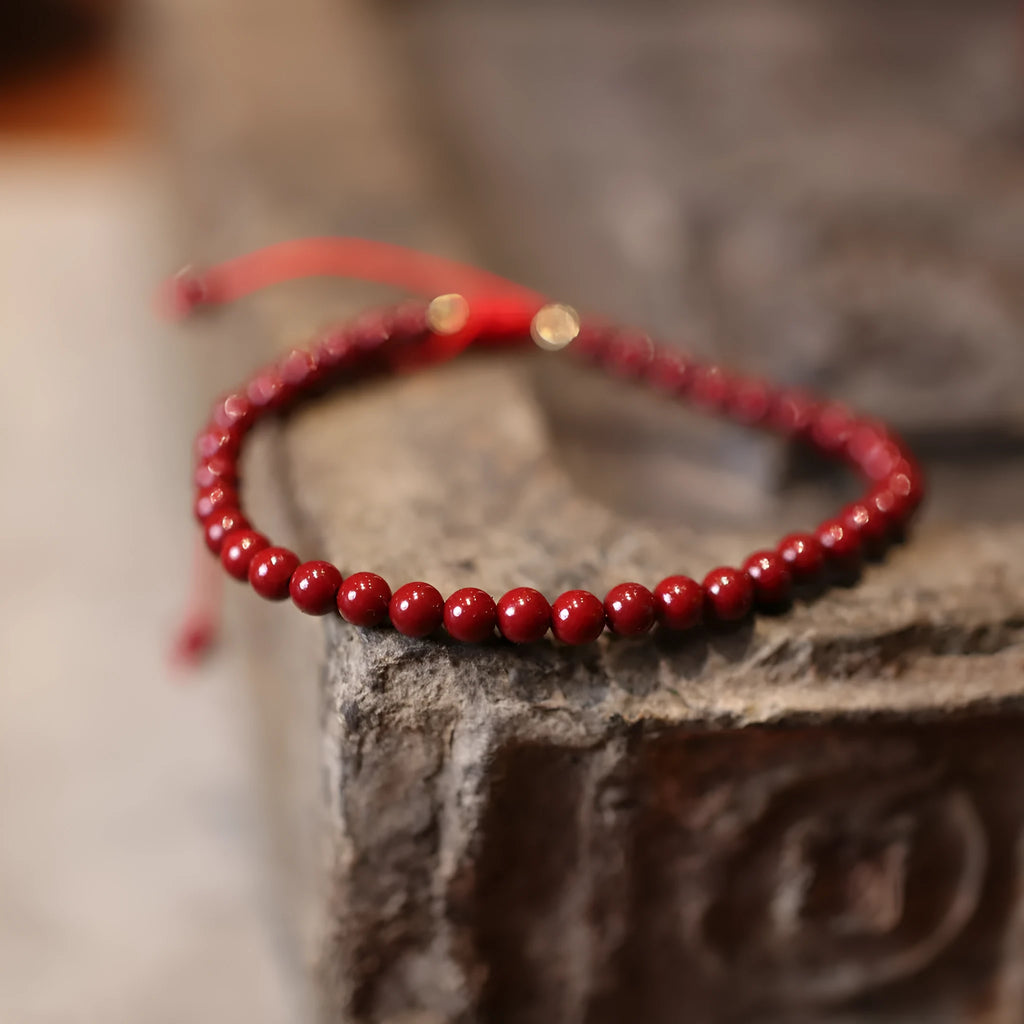Handcrafted cinnabar bracelet with purple-gold sand geometric design, traditional Chinese style women's jewellery