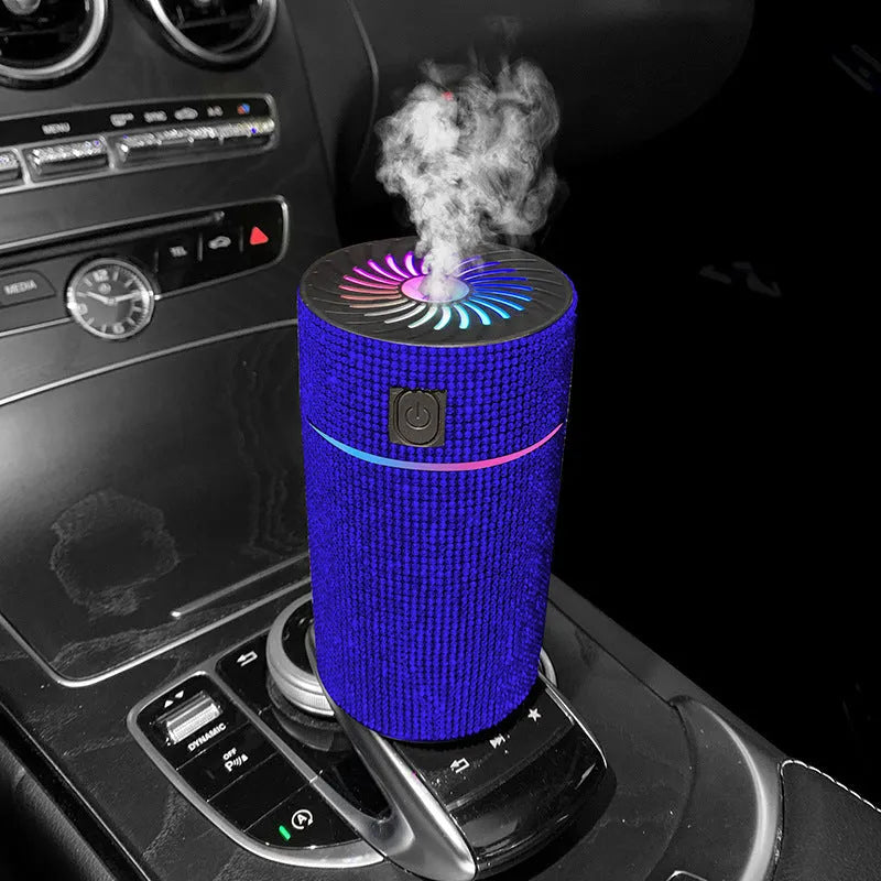 Car-mounted air purifier humidifier unit showing compact design and USB power connection