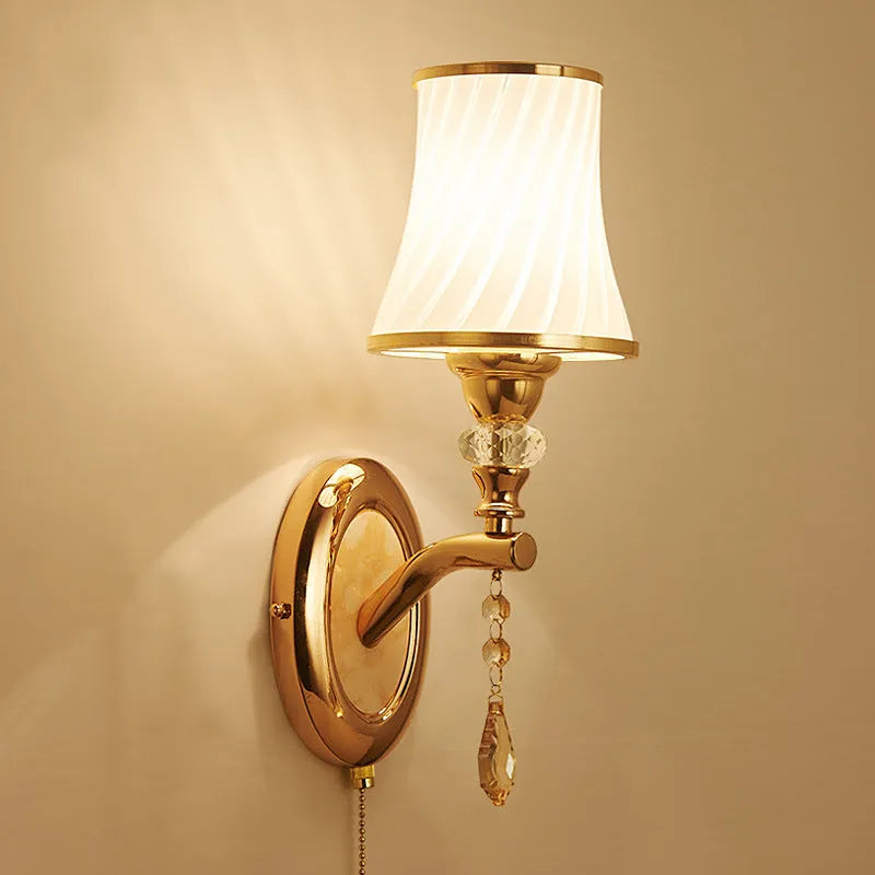 European-style glass wall lamp mounted on a wall, shown in a single head configuration.