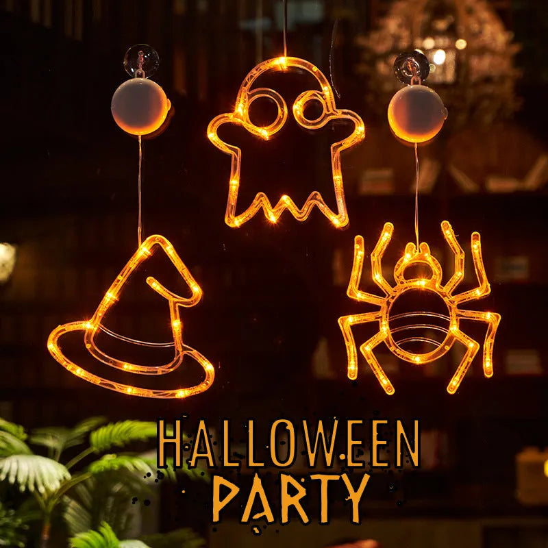 Seven Halloween LED hanging lights with spider, pumpkin and ghost designs featuring suction cups