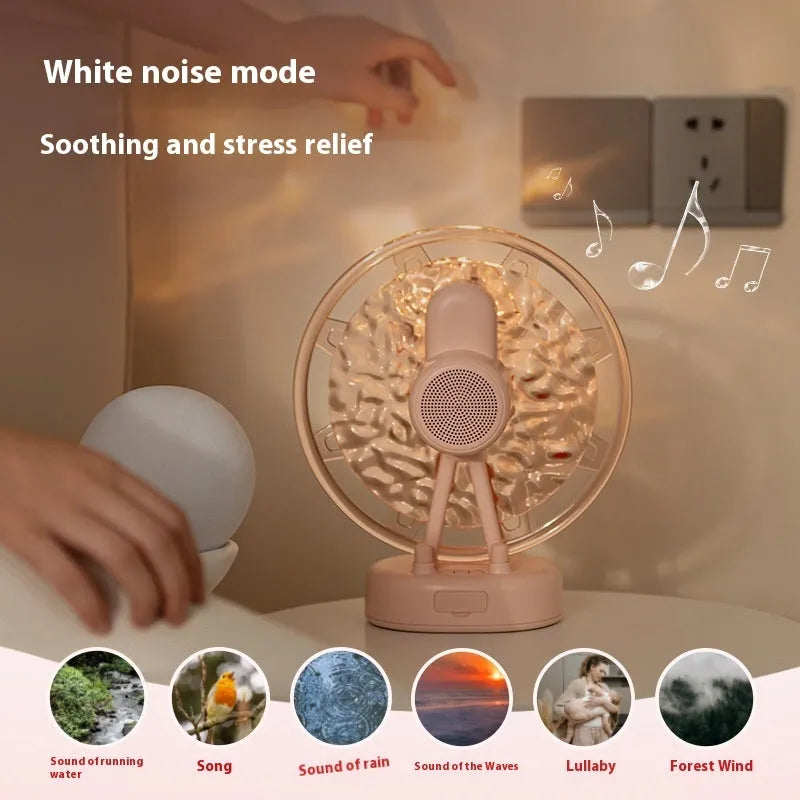 White Ferris wheel Bluetooth speaker with colourful atmospheric lighting effects on display