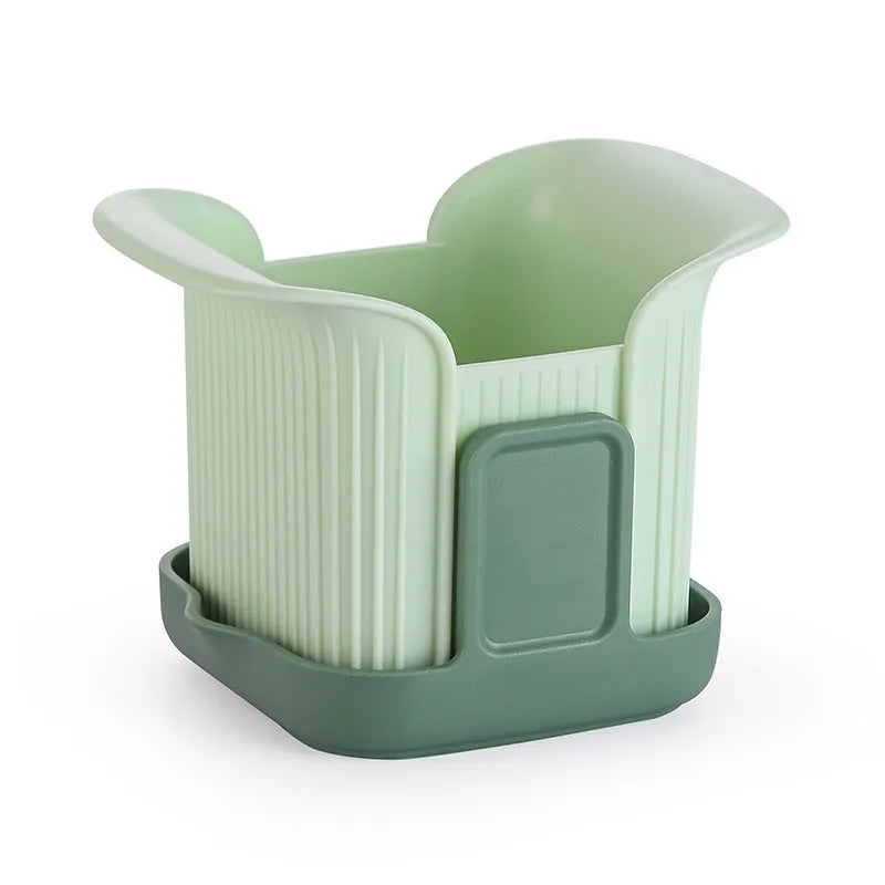 Green manual vegetable chopper with stainless steel blades for onions and potatoes.