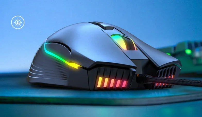 Black wired ergonomic gaming mouse with RGB lighting, seven buttons, four-way scroll wheel, and 1.5m USB cable on a dark surface