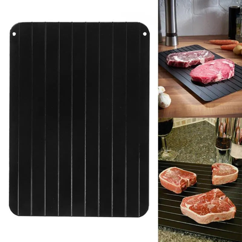 Black aluminium fast defrosting tray with silica gel feet on a kitchen countertop.