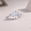 Egg-shaped moissanite ring 10x14mm in S925 silver with platinum plating, GRA certificate and gift box.