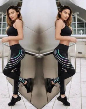 Women's black workout leggings with night glowing print pattern in pencil pants style