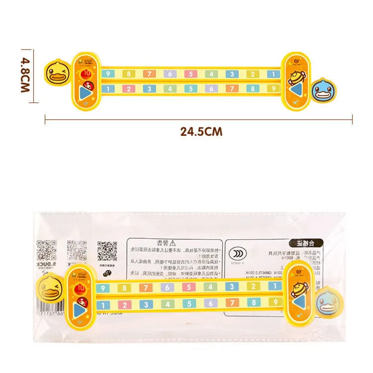 Yellow plastic children's digital resolution ruler with cartoon graphics measuring 24.5 cm long
