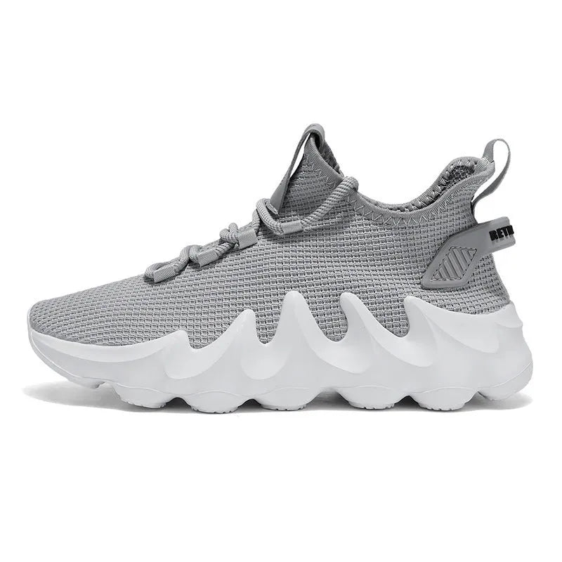 Men's low-top sock-like sports shoes in grey with a round toe, flat heel, and lace-up front.