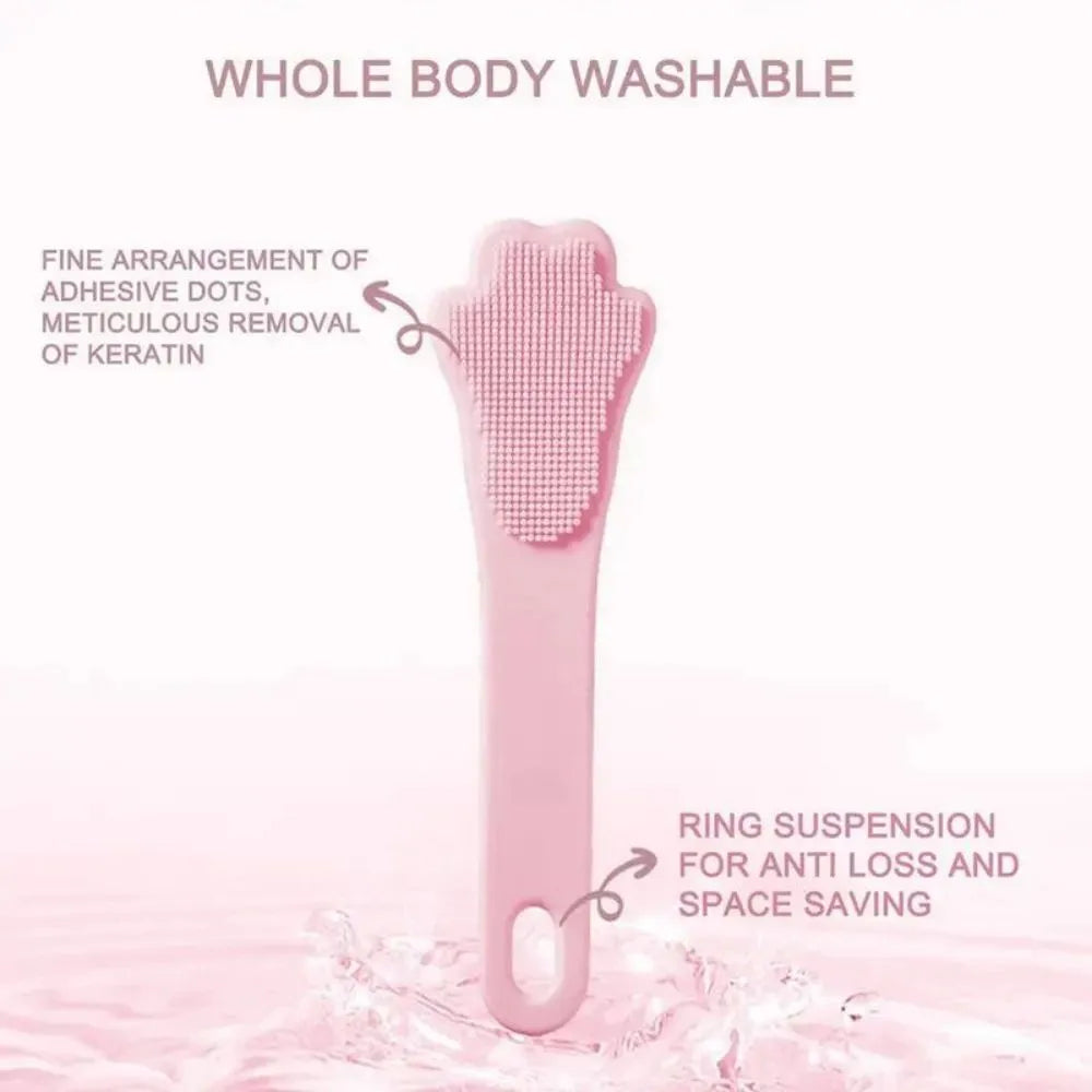 Pink silicone finger cover toothbrush for pets on a white background