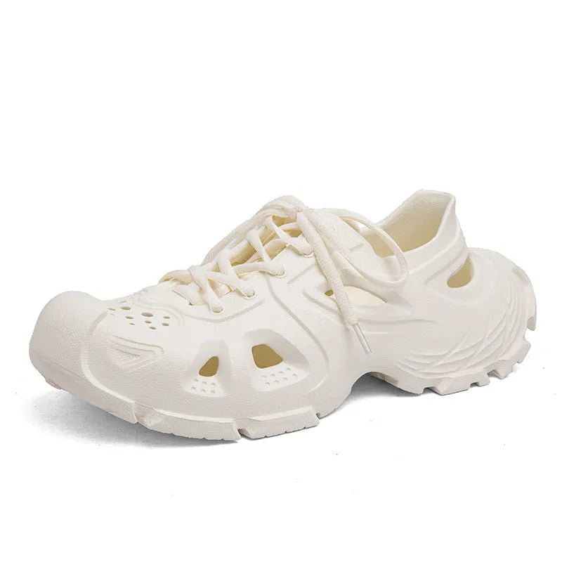 Men's black lace-up outdoor sports sandals with round toe and EVA sole on a rocky path.