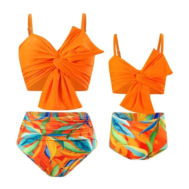 Women's bikini swim set with big bow design on nylon swim trunks in multiple colour options
