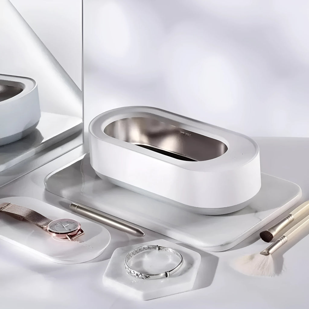 White portable ultrasonic cleaning machine with stainless steel tank and digital timer display.