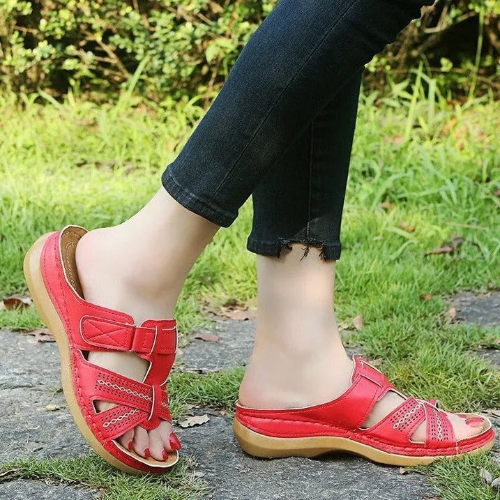 Women's black hollow peep toe wedge sandals with a Velcro strap closure