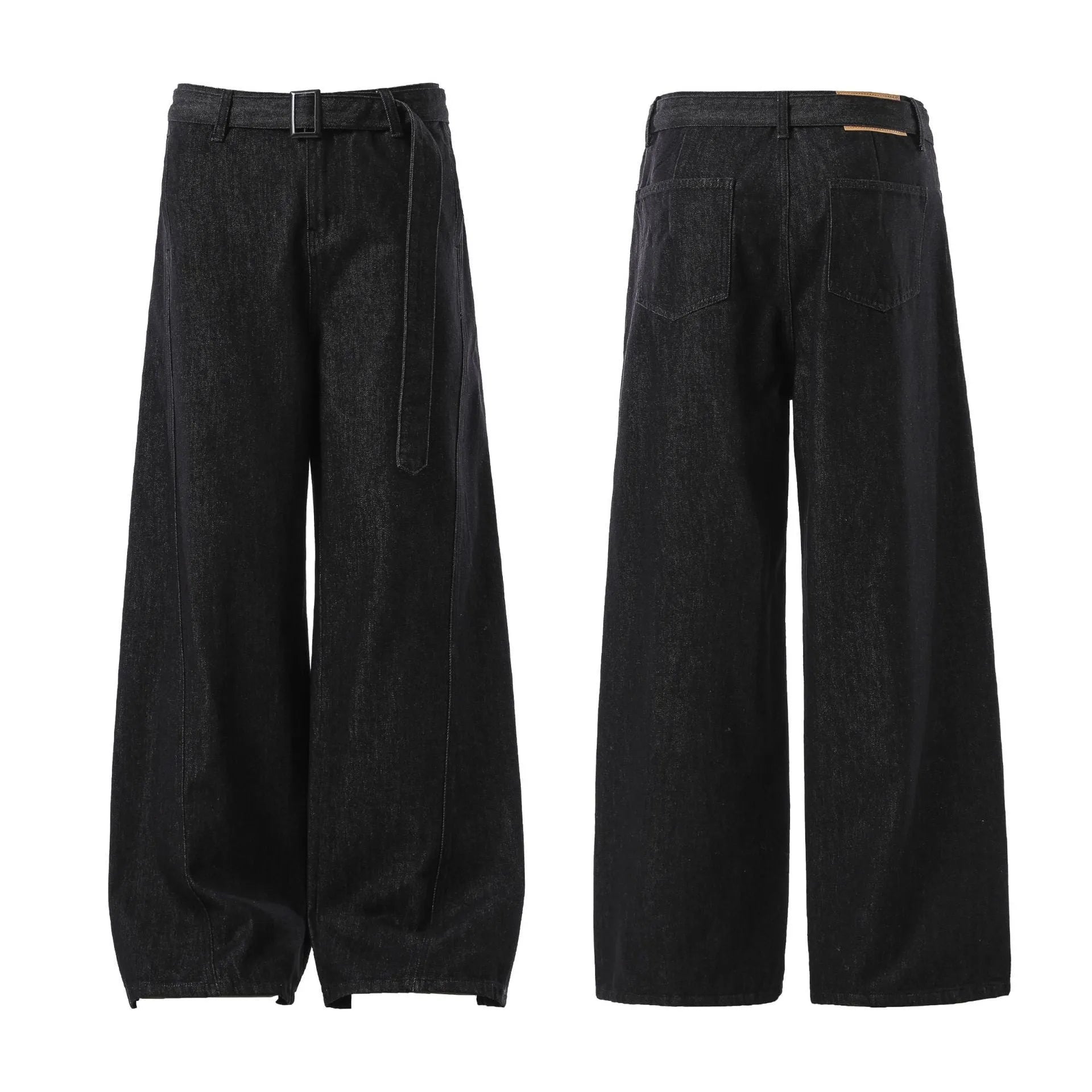 Black high waist straight leg jeans with gold details on a model.