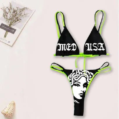 Women's black curve skull tube top bikini set with matching shorts, polyester fabric