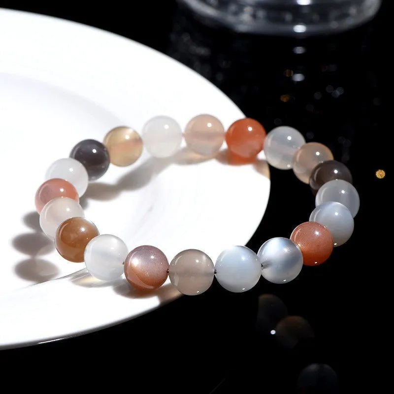 Natural colourful moonstone unisex bracelet with 8mm beads in a single circle.