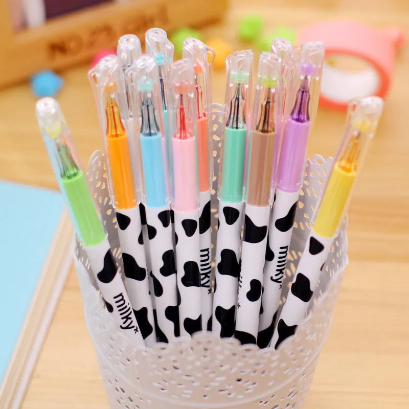 Set of 12 cow pattern gel pens with 0.38mm fine tips in assorted colours.
