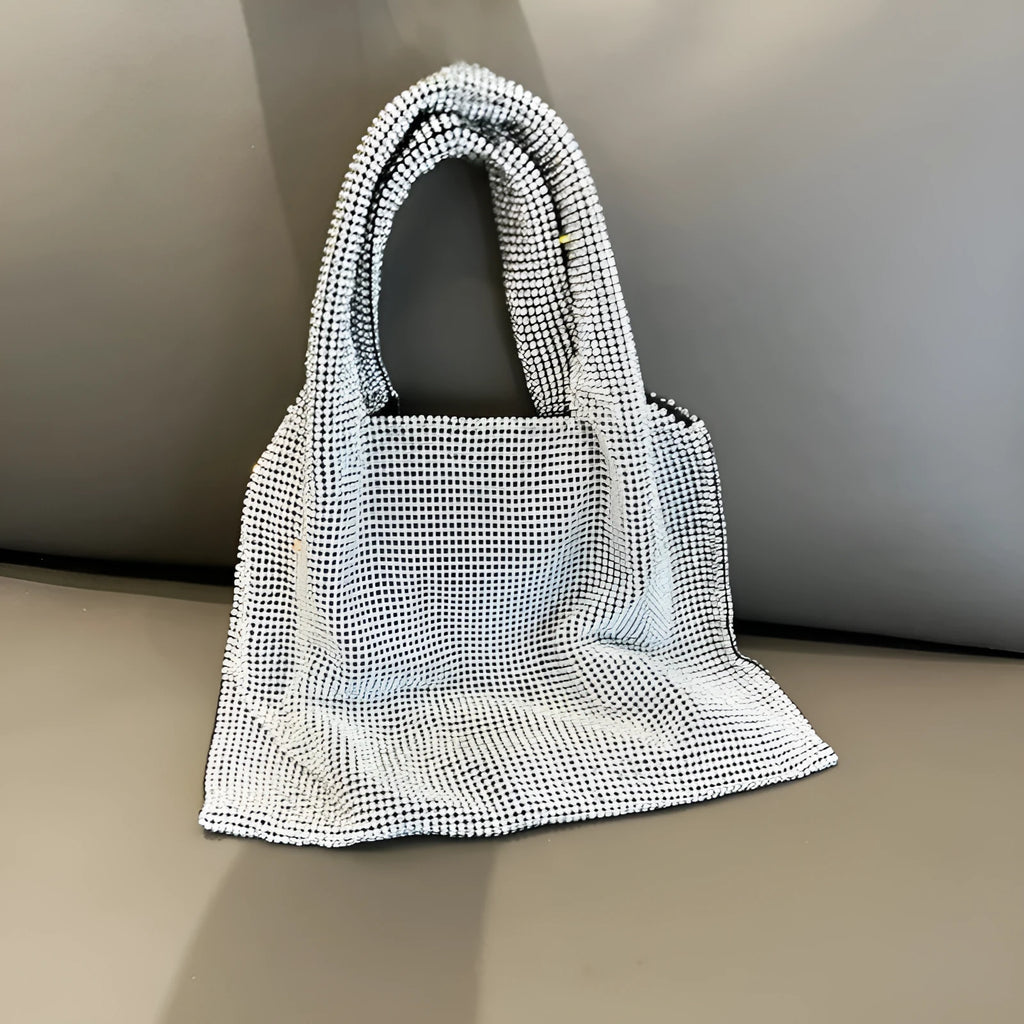 Silver evening handbag with shiny rhinestone decoration and cotton thread construction