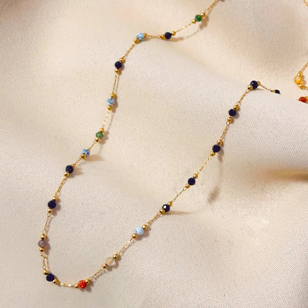 Gold electroplated titanium steel necklace with natural stone pendant on O-ring chain