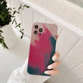 Soft silicone iPhone case with blue to purple oil painting gradient and abstract geometric pattern.