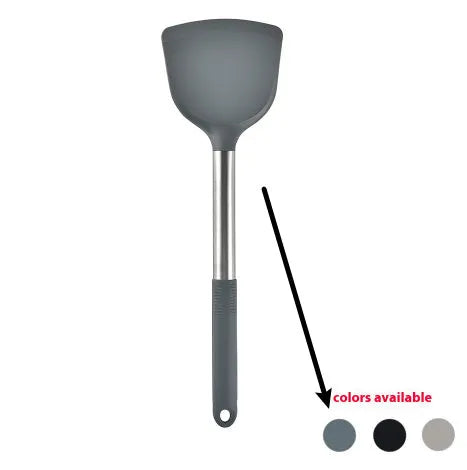 Silicone kitchen utensil set with twelve tools in a rotating white storage caddy on a counter.