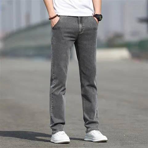 Men's straight leg jeans in smoky grey high elasticity fabric with zip fly closure
