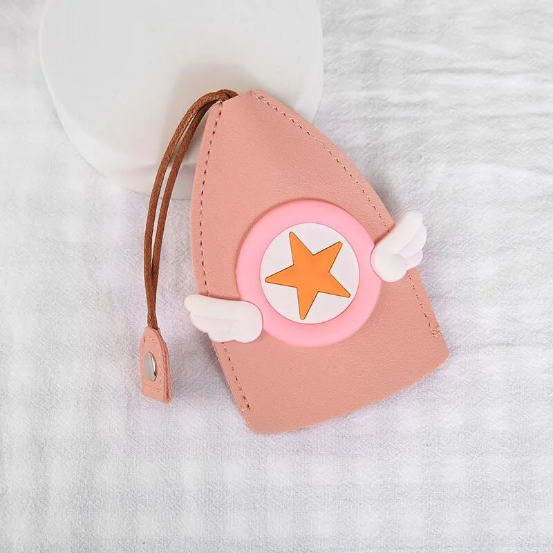 Colourful cartoon and resin design pull-out key case for car keys made from PU leather.