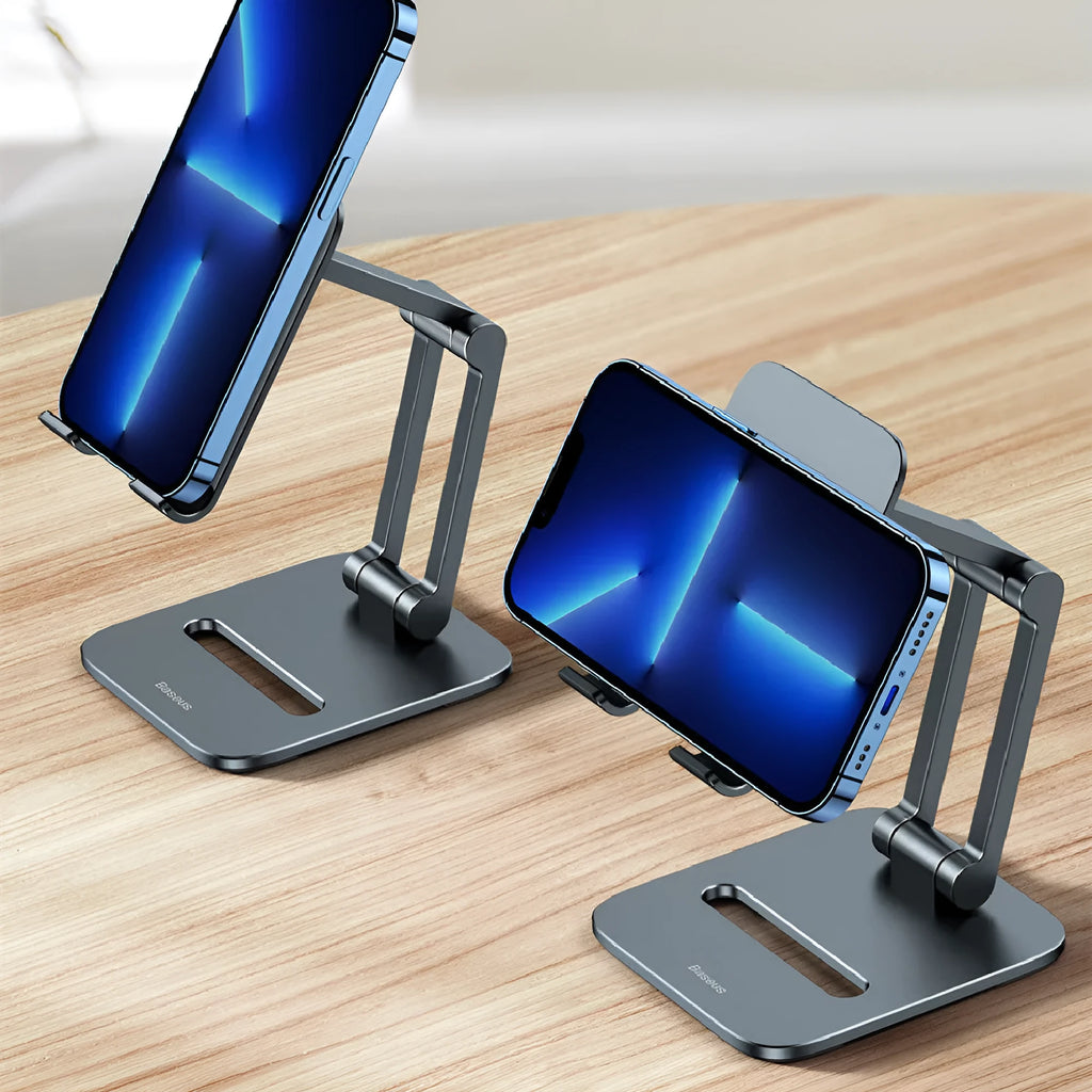 Deep space grey aluminium folding stand holding a tablet next to its compact folded size.